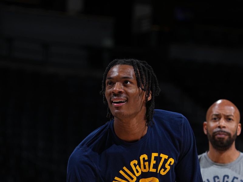 DENVER, CO - JANUARY 1: Bones Hyland #3 of the Denver Nuggets warms up before the game against the Boston Celtics on January 1, 2023 at the Ball Arena in Denver, Colorado. NOTE TO USER: User expressly acknowledges and agrees that, by downloading and/or using this Photograph, user is consenting to the terms and conditions of the Getty Images License Agreement. Mandatory Copyright Notice: Copyright 2022 NBAE (Photo by Garrett Ellwood/NBAE via Getty Images)