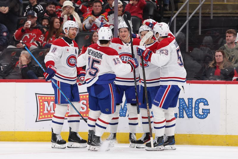 Nov 6, 2025; Newark, New Jersey, USA; Montreal Canadiens center Oliver Kapanen (91) celebrates his goal against the New Jersey Devils during the third period at Prudential Center. Mandatory Credit: Ed Mulholland-Imagn Images