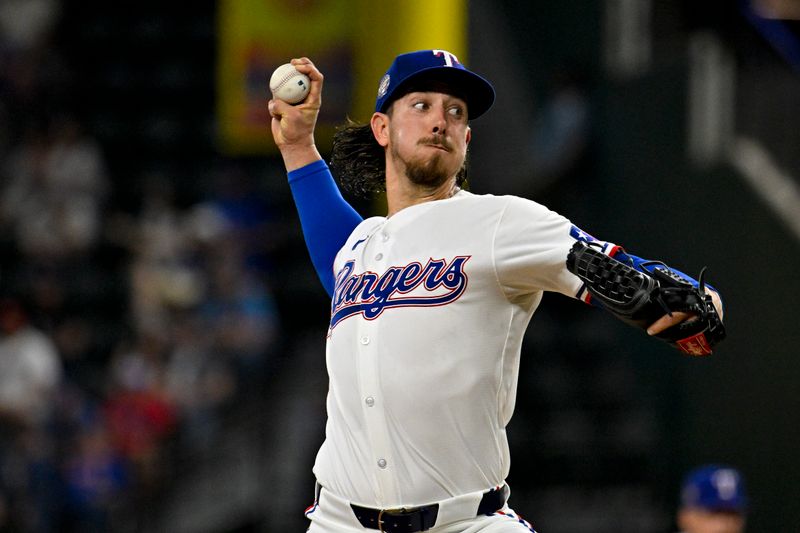 Apr 27, 2024; Arlington, Texas, USA; Texas Rangers starting pitcher Michael Lorenzen (23) pitches against the Cincinnati Reds during the third inning at Globe Life Field. Mandatory Credit: Jerome Miron-USA TODAY Sports