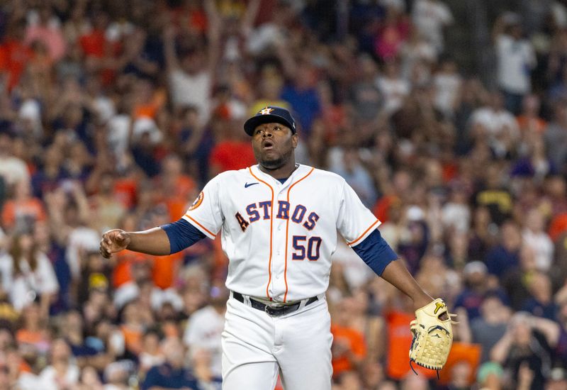 Sep 9, 2023; Houston, Texas, USA; Houston Astros relief pitcher Hector Neris (50) reacts after getting out of the  sixth inning with the bases full against the San Diego Padres at Minute Maid Park. Mandatory Credit: Thomas Shea-USA TODAY Sports