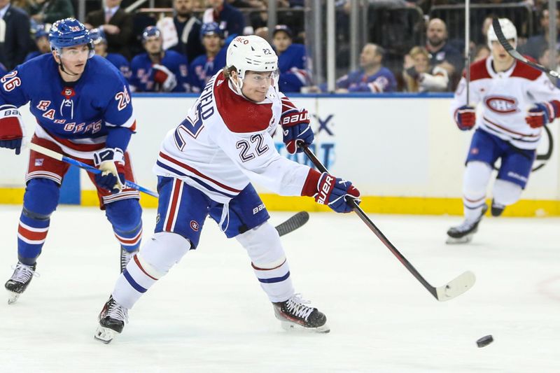 Feb 15, 2024; New York, New York, USA; Montreal Canadiens right wing Cole Caufield (22) attempts a shot on goal in the third period against the New York Rangers at Madison Square Garden. Mandatory Credit: Wendell Cruz-USA TODAY Sports