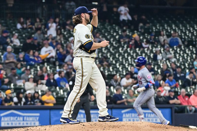 Apr 5, 2023; Milwaukee, Wisconsin, USA; Milwaukee Brewers pitcher Corbin Burnes (39) reacts after giving up a 2-run home run to New York Mets first baseman Pete Alonso (20) as he runs the bases in the fifth inning at American Family Field. Mandatory Credit: Benny Sieu-USA TODAY Sports