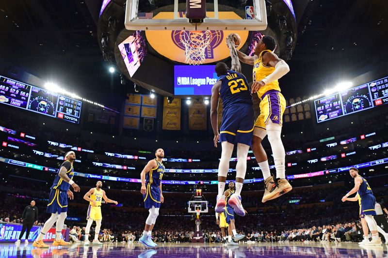 LOS ANGELES, CA - APRIL 9: Draymond Green #23 of the Golden State Warriors blocks Rui Hachimura #28 of the Los Angeles Lakers during the game on April 9, 2024 at Crypto.Com Arena in Los Angeles, California. NOTE TO USER: User expressly acknowledges and agrees that, by downloading and/or using this Photograph, user is consenting to the terms and conditions of the Getty Images License Agreement. Mandatory Copyright Notice: Copyright 2024 NBAE (Photo by Adam Pantozzi/NBAE via Getty Images)