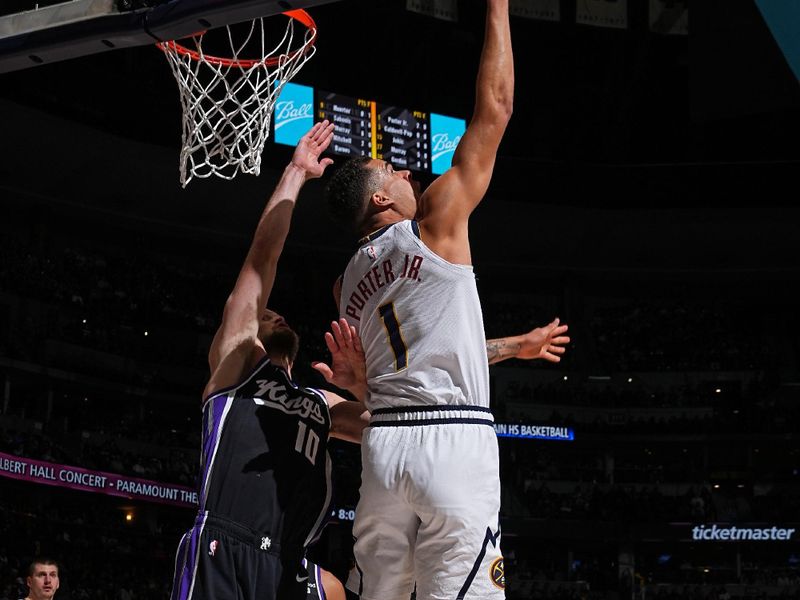 DENVER, CO - FEBRUARY 28: Michael Porter Jr. #1 of the Denver Nuggets drives to the basket during the game against the Sacramento Kings on February 28, 2024 at the Ball Arena in Denver, Colorado. NOTE TO USER: User expressly acknowledges and agrees that, by downloading and/or using this Photograph, user is consenting to the terms and conditions of the Getty Images License Agreement. Mandatory Copyright Notice: Copyright 2024 NBAE (Photo by Garrett Ellwood/NBAE via Getty Images)