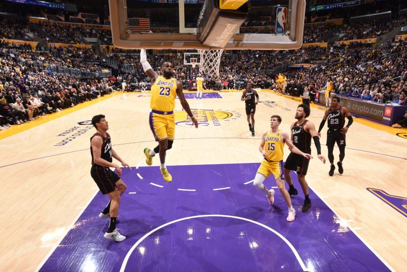 LOS ANGELES, CA - JANUARY 6: LeBron James #23 of the Los Angeles Lakers drives to the basket during the game against the Detroit Pistons on January 6, 2024 at Crypto.Com Arena in Los Angeles, California. NOTE TO USER: User expressly acknowledges and agrees that, by downloading and/or using this Photograph, user is consenting to the terms and conditions of the Getty Images License Agreement. Mandatory Copyright Notice: Copyright 2024 NBAE (Photo by Adam Pantozzi/NBAE via Getty Images)