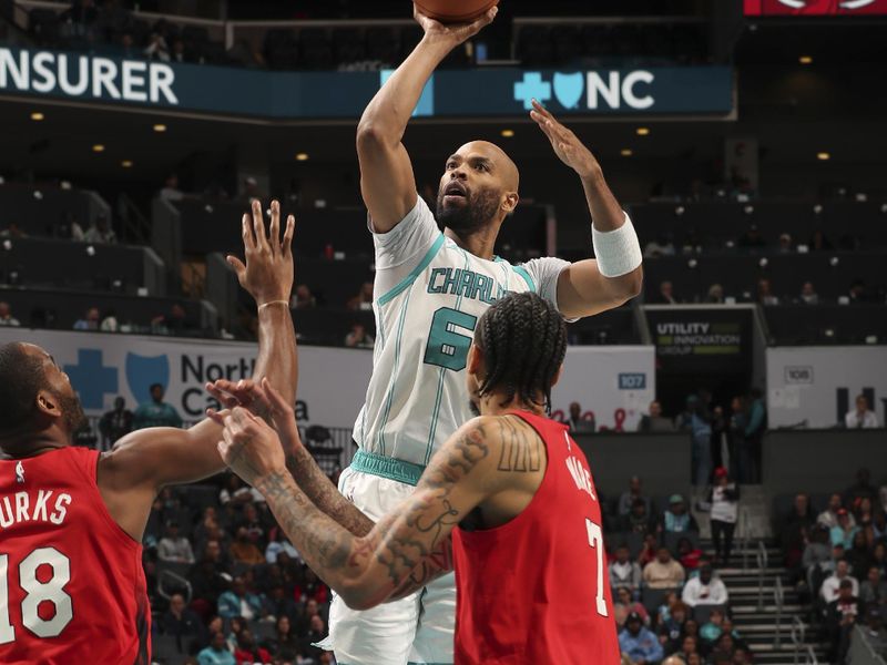 CHARLOTTE, NC - NOVEMBER 27:  Taj Gibson #67 of the Charlotte Hornets shoots the ball during the game against the Miami Heat on November 27, 2024 at Spectrum Center in Charlotte, North Carolina. NOTE TO USER: User expressly acknowledges and agrees that, by downloading and or using this photograph, User is consenting to the terms and conditions of the Getty Images License Agreement. Mandatory Copyright Notice: Copyright 2024 NBAE (Photo by Kent Smith/NBAE via Getty Images)