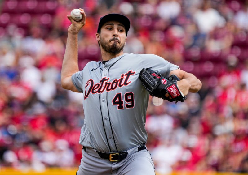 Jul 6, 2024; CINCINNATI, OHIO: Detroit Tigers pitcher Alex Faedo (49) pitches to the Cincinnati Reds in the 1st inning at Great American Ball Park. Mandatory Credit: Cara Owsley-The Enquirer