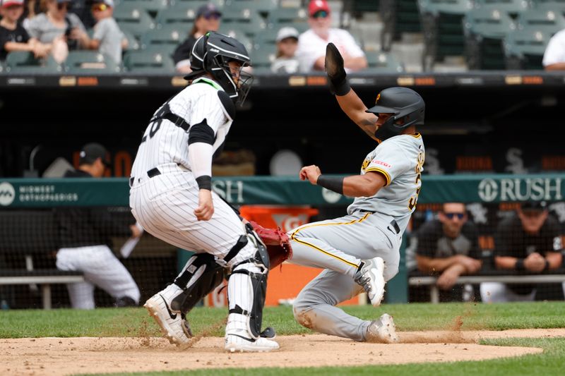 Jul 14, 2024; Chicago, Illinois, USA; Pittsburgh Pirates second baseman Nick Gonzales (39) scores against the Chicago White Sox during the seventh inning at Guaranteed Rate Field. Mandatory Credit: Kamil Krzaczynski-USA TODAY Sports