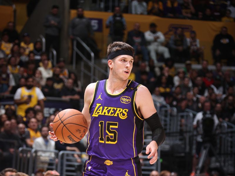 LOS ANGELES, CA - FEBRUARY 25: Austin Reaves #15 of the Los Angeles Lakers dribbles the ball during the game against the Dallas Mavericks on February 25, 2025 at Crypto.Com Arena in Los Angeles, California. NOTE TO USER: User expressly acknowledges and agrees that, by downloading and/or using this Photograph, user is consenting to the terms and conditions of the Getty Images License Agreement. Mandatory Copyright Notice: Copyright 2025 NBAE (Photo by Nathaniel S. Butler/NBAE via Getty Images)