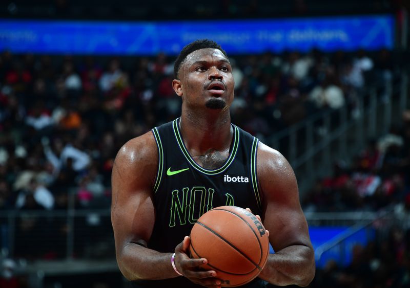 ATLANTA, GA - MARCH 10: Zion Williamson #1 of the New Orleans Pelicans shoots a free throw during the game against the Atlanta Hawks on March 10, 2024 at State Farm Arena in Atlanta, Georgia.  NOTE TO USER: User expressly acknowledges and agrees that, by downloading and/or using this Photograph, user is consenting to the terms and conditions of the Getty Images License Agreement. Mandatory Copyright Notice: Copyright 2024 NBAE (Photo by Scott Cunningham/NBAE via Getty Images)