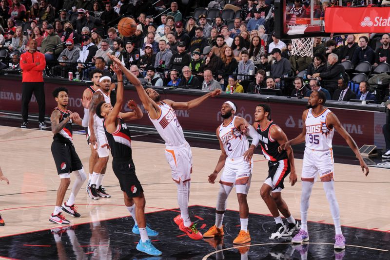 PORTLAND, OR - JANUARY 14: Keita Bates-Diop #21 of the Phoenix Suns rebounds the ball during the game against the Portland Trail Blazers on January 14, 2024 at the Moda Center Arena in Portland, Oregon. NOTE TO USER: User expressly acknowledges and agrees that, by downloading and or using this photograph, user is consenting to the terms and conditions of the Getty Images License Agreement. Mandatory Copyright Notice: Copyright 2024 NBAE (Photo by Cameron Browne/NBAE via Getty Images)