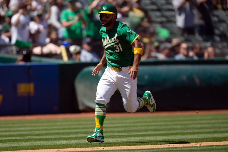 Aug 7, 2024; Oakland, California, USA; Oakland Athletics third baseman Abraham Toro (31) scores the tying run against the Chicago White Sox during the seventh inning at Oakland-Alameda County Coliseum. Mandatory Credit: D. Ross Cameron-USA TODAY Sports