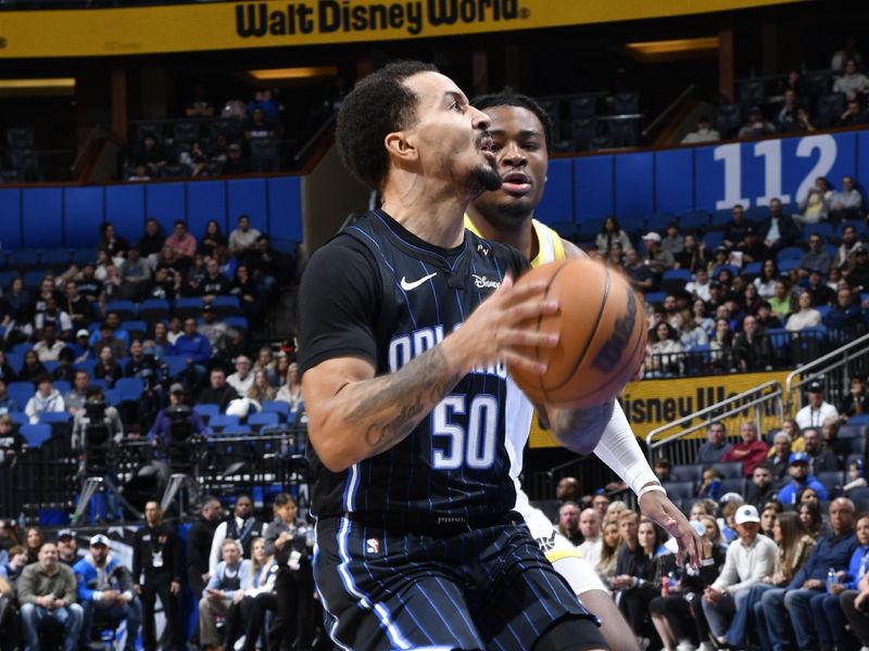 ORLANDO, FL - JANUARY 5 :  Cole Anthony #50 of the Orlando Magic drives to the basket during the game against the Utah Jazz on January 5, 2025 at Kia Center in Orlando, Florida. NOTE TO USER: User expressly acknowledges and agrees that, by downloading and or using this photograph, User is consenting to the terms and conditions of the Getty Images License Agreement. Mandatory Copyright Notice: Copyright 2025 NBAE (Photo by Gary Bassing/NBAE via Getty Images)