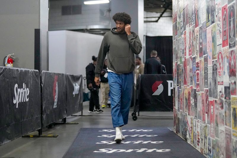 PORTLAND, OREGON - FEBRUARY 25: Matisse Thybulle #4 of the Portland Trail Blazers arrives to the arena prior to the game against the Charlotte Hornets at Moda Center on February 25, 2024 in Portland, Oregon. NOTE TO USER: User expressly acknowledges and agrees that, by downloading and or using this photograph, User is consenting to the terms and conditions of the Getty Images License Agreement. (Photo by Soobum Im/Getty Images)