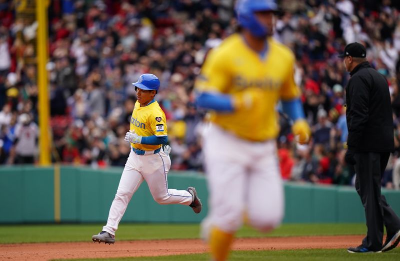 oApr 14, 2024; Boston, Massachusetts, USA; Boston Red Sox left fielder Masataka Yoshida (7) hits a two run home run against the Los Angeles Angels iin the sixth inning at Fenway Park. Mandatory Credit: David Butler II-USA TODAY Sports