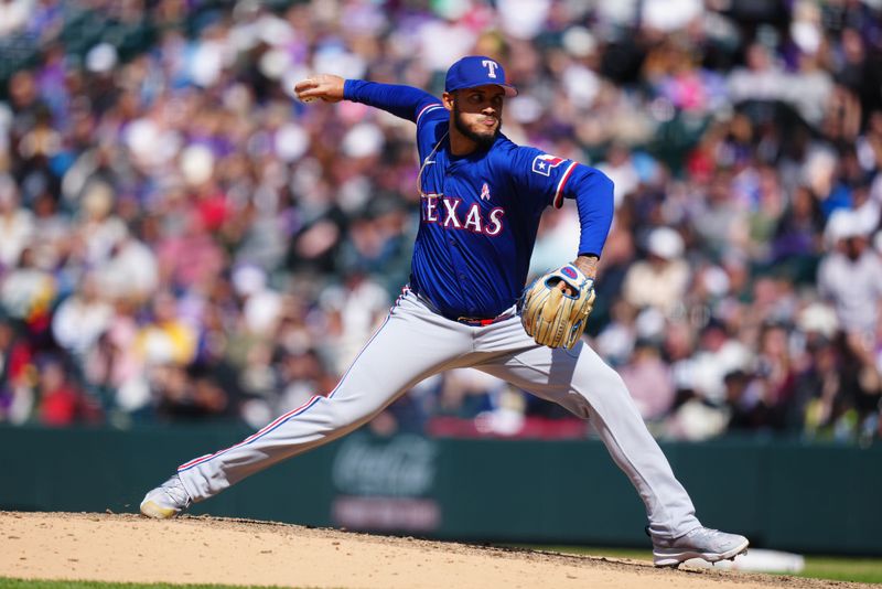 May 12, 2024; Denver, Colorado, USA; Texas Rangers pitcher Jonathan Hernández (72) delivers a pitch in the sixth inning against the Colorado Rockies at Coors Field. Mandatory Credit: Ron Chenoy-USA TODAY Sports