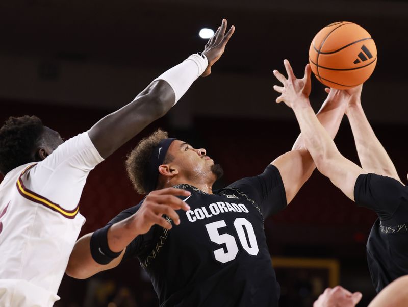 Jan 3, 2026; Tempe, Arizona, USA; Colorado Buffaloes center Elijah Malone (50) against the Arizona State Sun Devils in the first half at Desert Financial Arena. Mandatory Credit: Mark J. Rebilas-Imagn Images