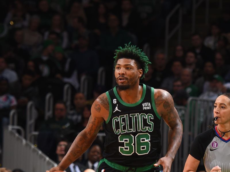 BOSTON, MA - NOVEMBER 27: Marcus Smart #36 of the Boston Celtics dribbles the ball during the game against the Washington Wizards on November 27, 2022 at the TD Garden in Boston, Massachusetts.  NOTE TO USER: User expressly acknowledges and agrees that, by downloading and or using this photograph, User is consenting to the terms and conditions of the Getty Images License Agreement. Mandatory Copyright Notice: Copyright 2022 NBAE  (Photo by Brian Babineau/NBAE via Getty Images)