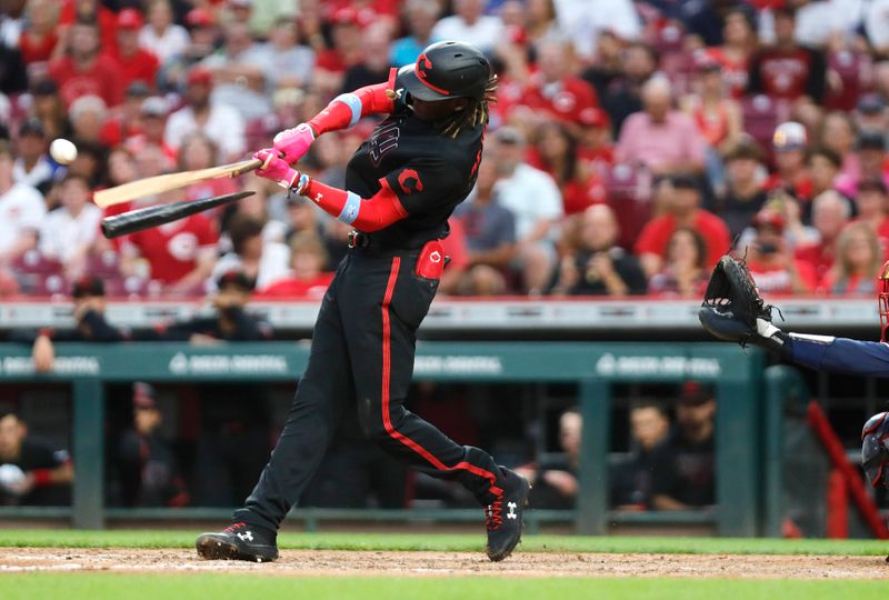 Jun 23, 2023; Cincinnati, Ohio, USA; Cincinnati Reds third baseman Elly De La Cruz (44) breaks his bat hitting a two-run single against the Atlanta Braves during the fifth inning at Great American Ball Park. Mandatory Credit: David Kohl-USA TODAY Sports