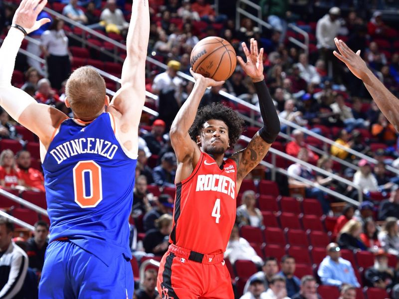 HOUSTON, TX - FEBRUARY 1: Jalen Green #4 of the Houston Rockets shoots a three point basket during the game against the New York Knicks on February 1, 2024 at the Toyota Center in Houston, Texas. NOTE TO USER: User expressly acknowledges and agrees that, by downloading and or using this photograph, User is consenting to the terms and conditions of the Getty Images License Agreement. Mandatory Copyright Notice: Copyright 2024 NBAE (Photo by Logan Riely/NBAE via Getty Images)