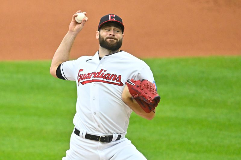 Sep 26, 2023; Cleveland, Ohio, USA; Cleveland Guardians starting pitcher Lucas Giolito (27) delivers a pitch in the first inning against the Cincinnati Reds at Progressive Field. Mandatory Credit: David Richard-USA TODAY Sports