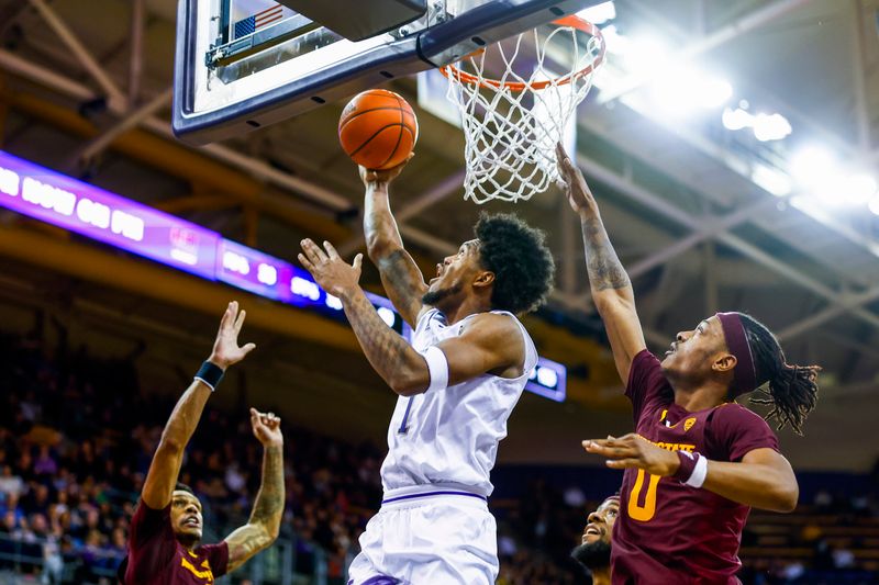 Jan 26, 2023; Seattle, Washington, USA; Washington Huskies forward Keion Brooks (1) makes a layup against Arizona State Sun Devils guard DJ Horne (0) during the first half at Alaska Airlines Arena at Hec Edmundson Pavilion. Mandatory Credit: Joe Nicholson-USA TODAY Sports