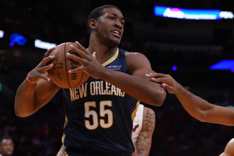 MIAMI, FL - OCTOBER 13: Trey Jemison #55 of the New Orleans Pelicans handles the ball during the game against the Miami Heat during a preseason game on October 13, 2024 at Kaseya Center in Miami, Florida. NOTE TO USER: User expressly acknowledges and agrees that, by downloading and or using this Photograph, user is consenting to the terms and conditions of the Getty Images License Agreement. Mandatory Copyright Notice: Copyright 2024 NBAE (Photo by Eric Espada/NBAE via Getty Images)