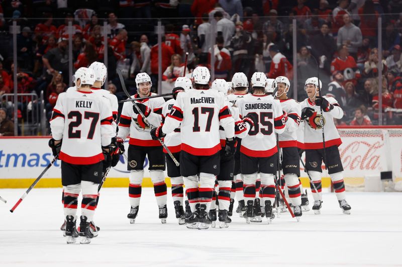 Apr 7, 2024; Washington, District of Columbia, USA; Ottawa Senators goaltender Joonas Korpisalo (70) celebrates with teammates after their game against the Washington Capitals at Capital One Arena. Mandatory Credit: Geoff Burke-USA TODAY Sports