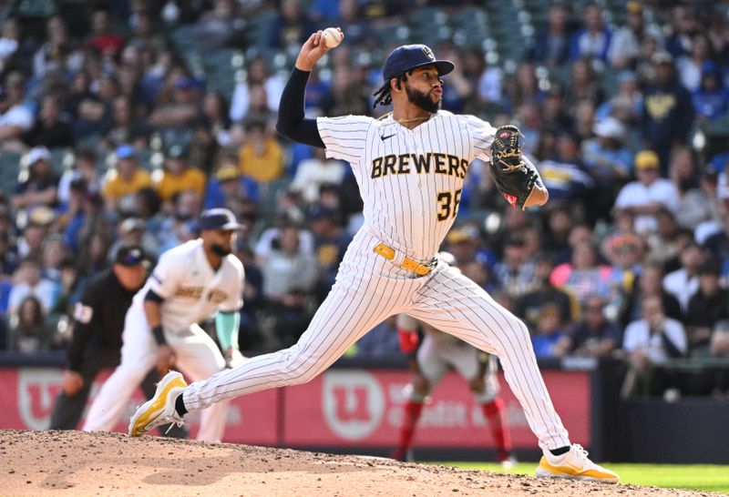 Sep 17, 2023; Milwaukee, Wisconsin, USA; Milwaukee Brewers relief pitcher Devin Williams (38) delivers a pitch against the Washington Nationals in the ninth inning at American Family Field. Mandatory Credit: Michael McLoone-USA TODAY Sports