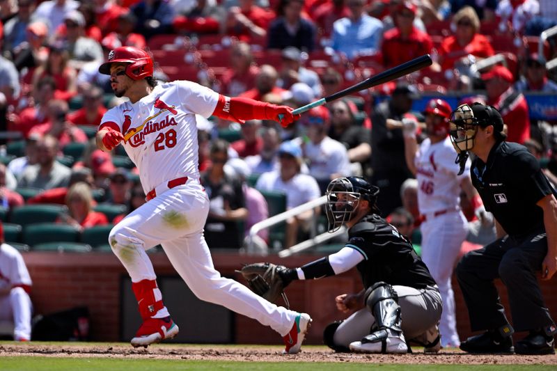 Apr 24, 2024; St. Louis, Missouri, USA;  St. Louis Cardinals third baseman Nolan Arenado (28) hits a one run single against the Arizona Diamondbacks during the sixth inning at Busch Stadium. Mandatory Credit: Jeff Curry-USA TODAY Sports
