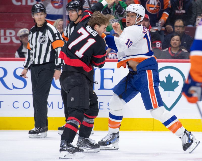 Mar 19, 2026; Ottawa, Ontario, CAN; Ottawa Senators center Ridly Greig (71) fights with New York Islanders center Brayden Schenn (10) in the first period at the Canadian Tire Centre. Mandatory Credit: Marc DesRosiers-IMAGN Images
