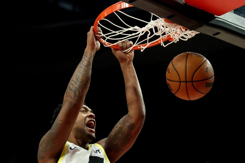 PORTLAND, OREGON - DECEMBER 06: Brice Sensabaugh #28 of the Utah Jazz dunks during the secondhalf at Moda Center on December 06, 2024 in Portland, Oregon. NOTE TO USER: User expressly acknowledges and agrees that, by downloading and or using this photograph, User is consenting to the terms and conditions of the Getty Images License Agreement. (Photo by Steph Chambers/Getty Images)