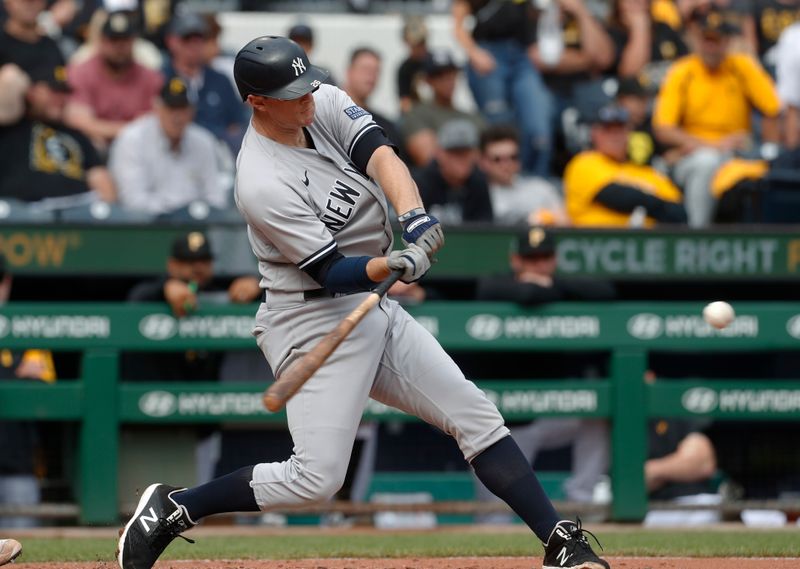 Sep 17, 2023; Pittsburgh, Pennsylvania, USA;  New York Yankees first baseman DJ LeMahieu (26) hits an RBI double against the Pittsburgh Pirates during the sixth inning at PNC Park. Pittsburgh won 3-2. Mandatory Credit: Charles LeClaire-USA TODAY Sports