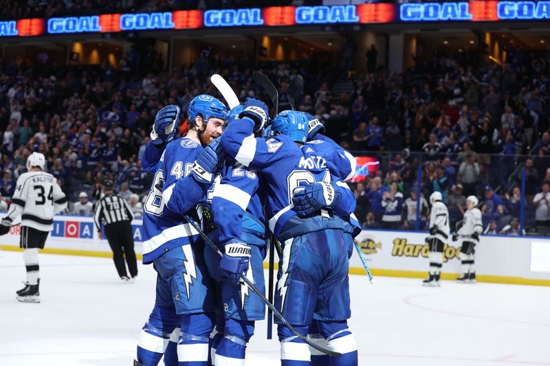 Jan 9, 2024; Tampa, Florida, USA; Tampa Bay Lightning center Tyler Motte (64) is congratulated after he scored a goal against the Los Angeles Kings during the third period at Amalie Arena. Mandatory Credit: Kim Klement Neitzel-USA TODAY Sports