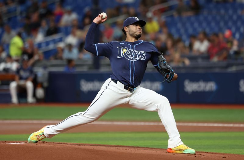 Jun 24, 2024; St. Petersburg, Florida, USA;  Tampa Bay Rays pitcher Taj Bradley (45) throws a pitch against the Seattle Mariners during the first inning at Tropicana Field. Mandatory Credit: Kim Klement Neitzel-USA TODAY Sports