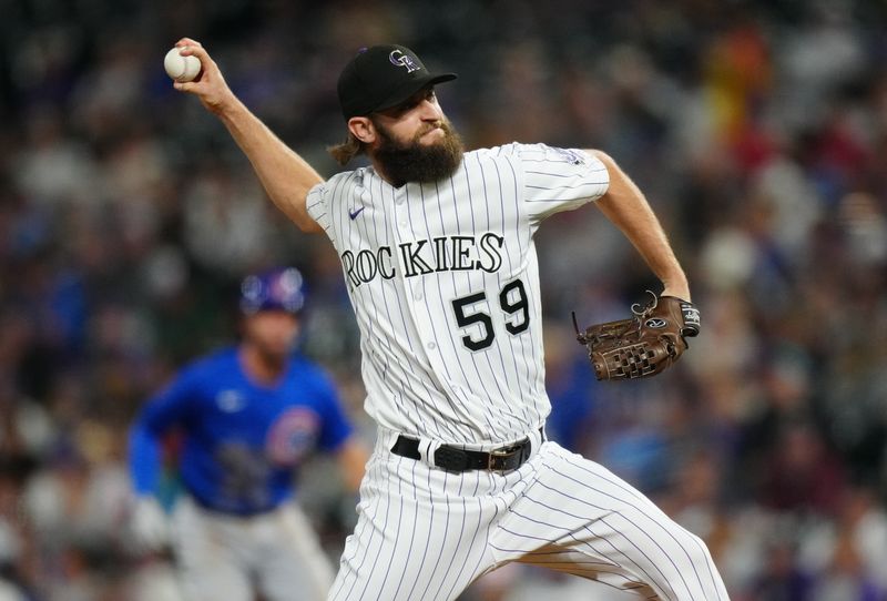 Sep 12, 2023; Denver, Colorado, USA; Colorado Rockies relief pitcher Jake Bird (59) delivers a pitch in the sixth inning against the Chicago Cubs at Coors Field. Mandatory Credit: Ron Chenoy-USA TODAY Sports