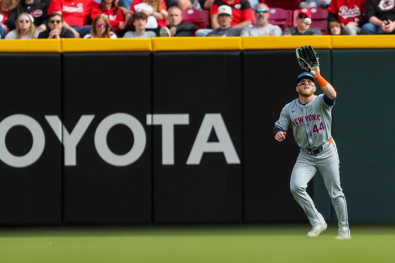 Apr 7, 2024; Cincinnati, Ohio, USA; New York Mets center fielder Harrison Bader (44) catches a pop up hit by Cincinnati Reds catcher Luke Maile (not pictured) in the ninth inning at Great American Ball Park. Mandatory Credit: Katie Stratman-USA TODAY Sports