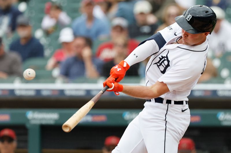 Jun 11, 2023; Detroit, Michigan, USA; Detroit Tigers right fielder Kerry Carpenter (30) hits a single in the first inning against the Arizona Diamondbacks at Comerica Park. Mandatory Credit: Rick Osentoski-USA TODAY Sports