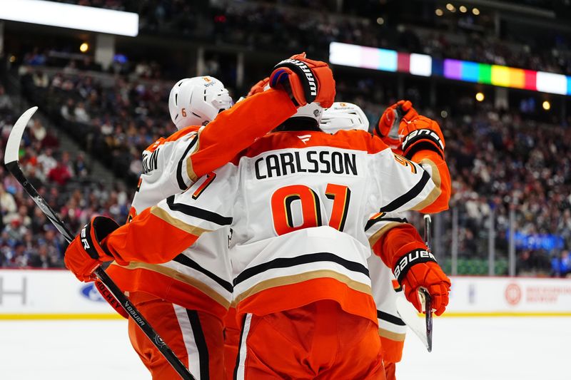 Oct 18, 2024; Denver, Colorado, USA; Anaheim Ducks center Leo Carlsson (91) celebrates his goal with teammates in the first period against the Colorado Avalanche at Ball Arena. Mandatory Credit: Ron Chenoy-Imagn Images