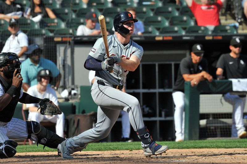 Aug 25, 2024; Chicago, Illinois, USA; Detroit Tigers second base Colt Keith (33) hits a two-run double during the eighth inning against the Chicago White Sox at Guaranteed Rate Field. Mandatory Credit: Patrick Gorski-USA TODAY Sports