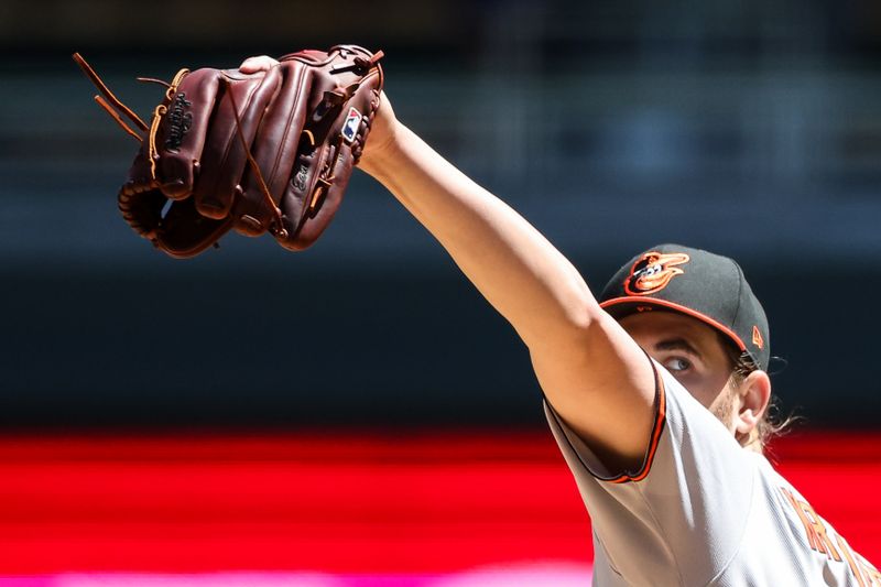 May 8, 2025; Minneapolis, Minnesota, USA; Baltimore Orioles starting pitcher Dean Kremer (64) delivers a pitch against the Minnesota Twins during the fifth inning at Target Field. Mandatory Credit: Matt Krohn-Imagn Images