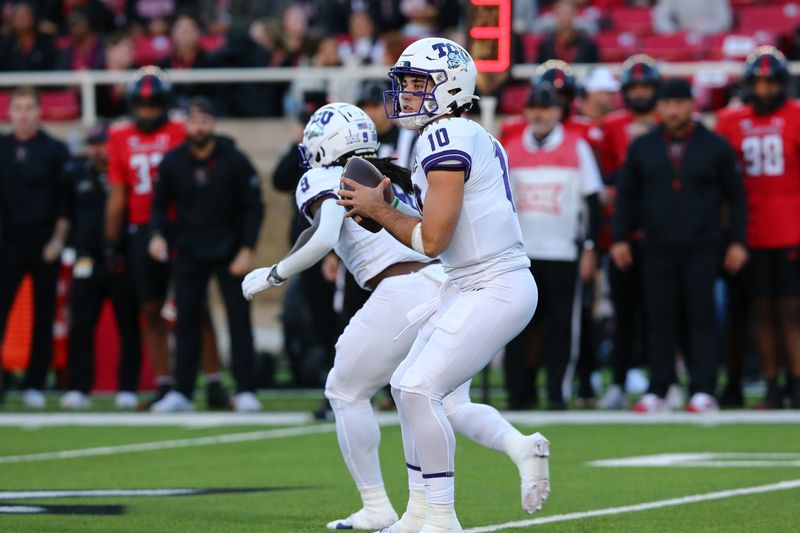 Nov 2, 2023; Lubbock, Texas, USA; Texas Christian Horned Frogs quarterback Josh Hoover (10) passes against the Texas Tech Red Raiders in the first half at Jones AT&T Stadium and Cody Campbell Field. Mandatory Credit: Michael C. Johnson-USA TODAY Sports