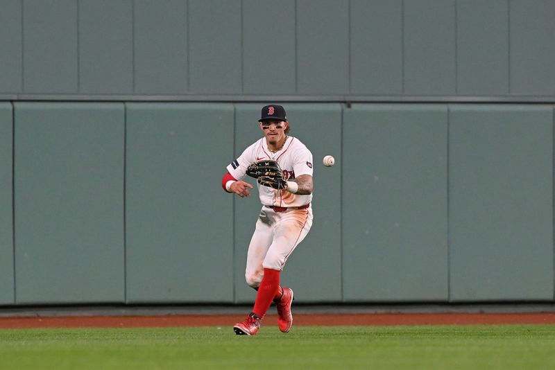 May 15, 2024; Boston, Massachusetts, USA; Boston Red Sox center fielder Jarren Duran (16) makes a catch against the Tampa Bay Rays during the sixth inning at Fenway Park. Mandatory Credit: Eric Canha-USA TODAY Sports