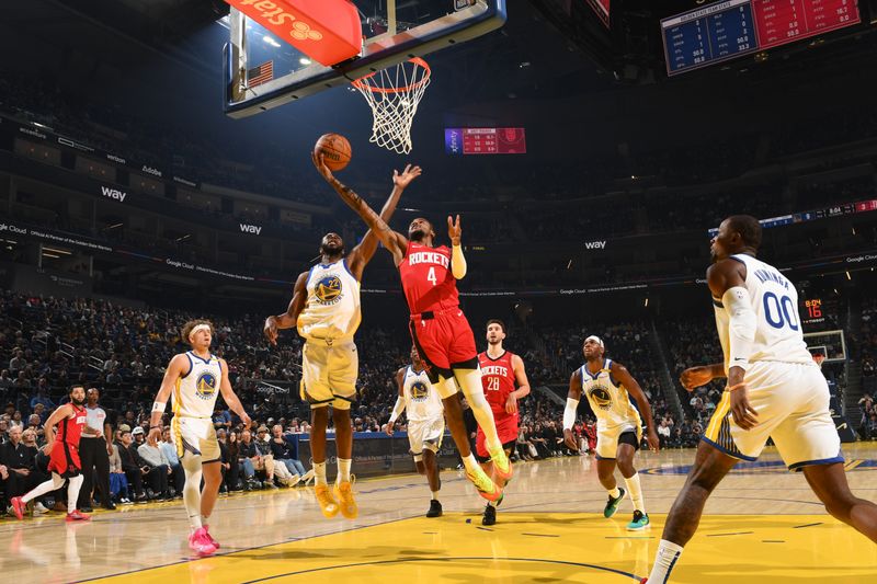 SAN FRANCISCO, CA - DECEMBER 5: Jalen Green #4 of the Houston Rockets drives to the basket during the game against the Golden State Warriors on December 5, 2024 at Chase Center in San Francisco, California. NOTE TO USER: User expressly acknowledges and agrees that, by downloading and or using this photograph, user is consenting to the terms and conditions of Getty Images License Agreement. Mandatory Copyright Notice: Copyright 2024 NBAE (Photo by Noah Graham/NBAE via Getty Images)