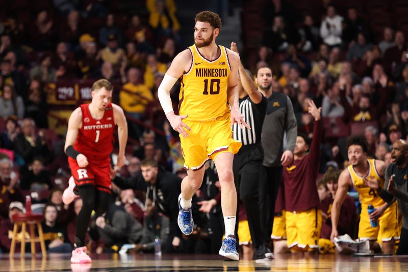 Mar 2, 2023; Minneapolis, Minnesota, USA; Minnesota Golden Gophers forward Jamison Battle (10) reacts to his shot against the Rutgers Scarlet Knights during the second half at Williams Arena. Mandatory Credit: Matt Krohn-USA TODAY Sports