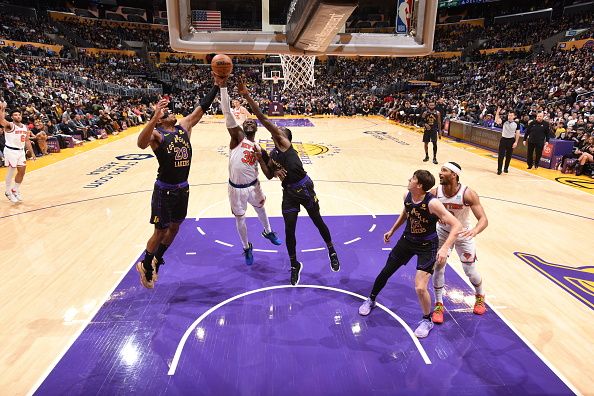 LOS ANGELES, CA - DECEMBER 18:  Rui Hachimura #28 of the Los Angeles Lakers Julius Randle #30 of the New York Knicks & Taurean Prince #12 of the Los Angeles Lakers battle for the rebound during the game on December 18, 2023 at Crypto.Com Arena in Los Angeles, California. NOTE TO USER: User expressly acknowledges and agrees that, by downloading and/or using this Photograph, user is consenting to the terms and conditions of the Getty Images License Agreement. Mandatory Copyright Notice: Copyright 2023 NBAE (Photo by Adam Pantozzi/NBAE via Getty Images)