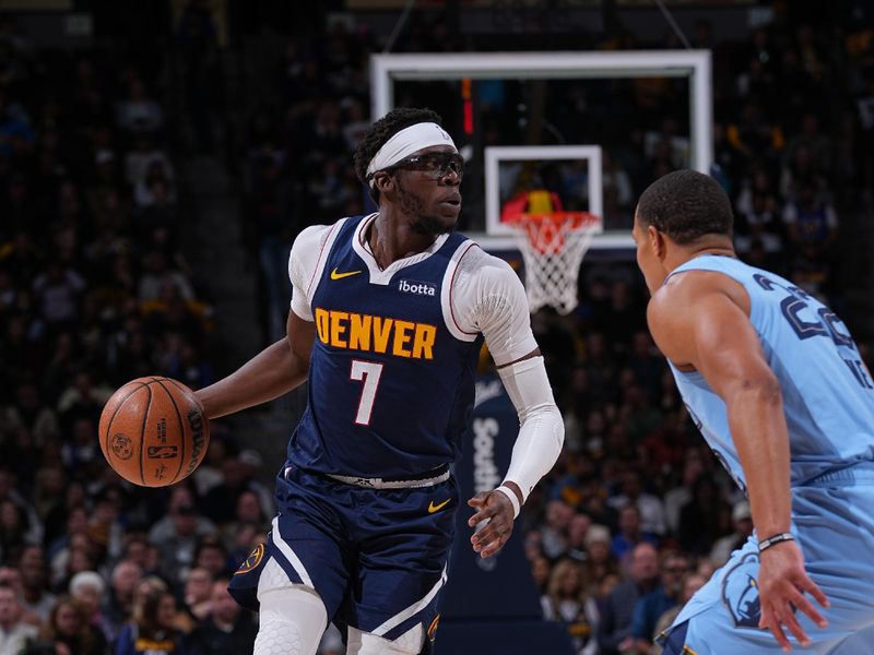 DENVER, CO - MARCH 25: Reggie Jackson #7 of the Denver Nuggets handles the ball during the game against the Memphis Grizzlies  on March 25, 2024 at the Ball Arena in Denver, Colorado. NOTE TO USER: User expressly acknowledges and agrees that, by downloading and/or using this Photograph, user is consenting to the terms and conditions of the Getty Images License Agreement. Mandatory Copyright Notice: Copyright 2024 NBAE (Photo by Bart Young/NBAE via Getty Images)