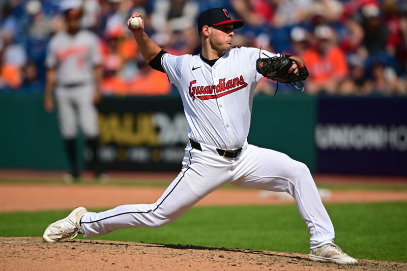 Aug 4, 2024; Cleveland, Ohio, USA; Cleveland Guardians starting pitcher Connor Gillispie (61) throws a pitch during the eighth inning against the Baltimore Orioles at Progressive Field. Mandatory Credit: David Dermer-USA TODAY Sports