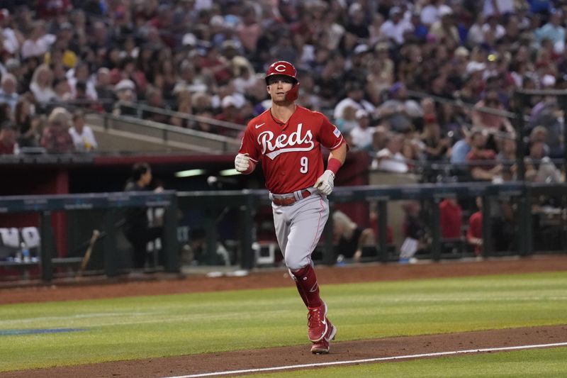 Aug 26, 2023; Phoenix, Arizona, USA; Cincinnati Reds second baseman Matt McLain (9) runs the bases after hitting a solo home run against the Arizona Diamondbacks during the sixth inning at Chase Field. Mandatory Credit: Joe Camporeale-USA TODAY Sports