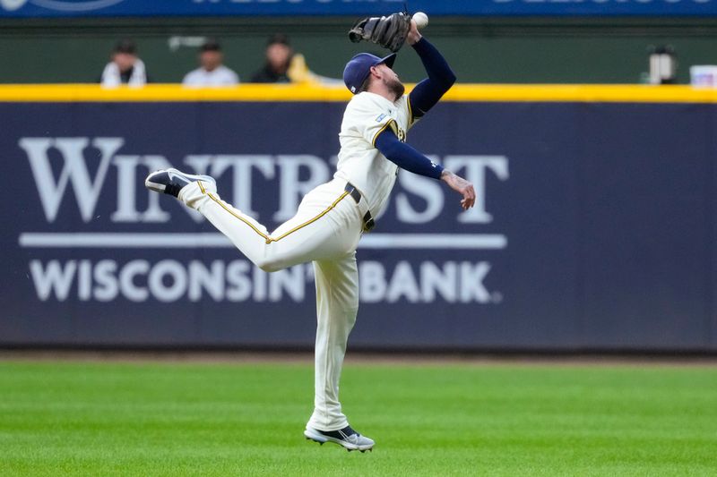 Sep 19, 2024; Milwaukee, Wisconsin, USA;  Milwaukee Brewers second baseman Brice Turang (2) is unable to catch a line drive during the first inning against the Arizona Diamondbacks at American Family Field. Mandatory Credit: Jeff Hanisch-Imagn Images